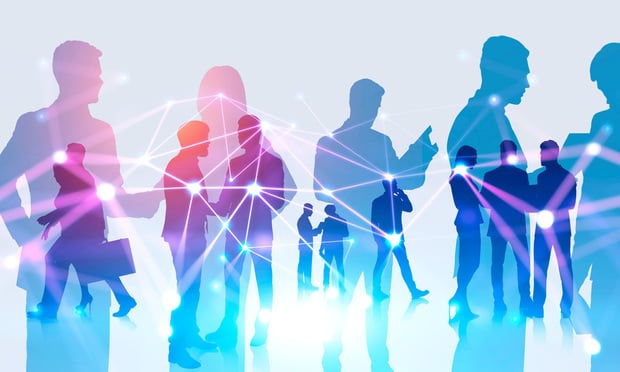 Silhouettes of business people in shades of blue, green, purple and pink.