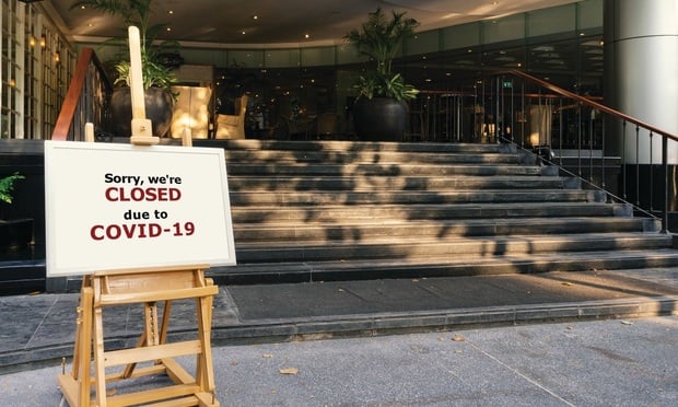 A sign outside of a business reading 