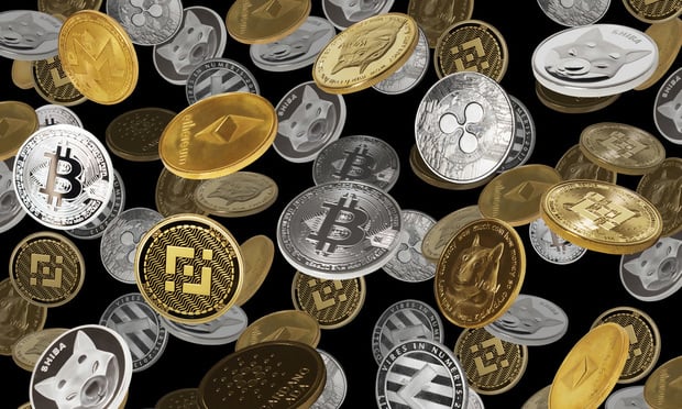 Falling cryptocurrencies (bitcoins, dogecoins, shiba coins, binance coins and other) Credit: Igor Faun/Shutterstock.com