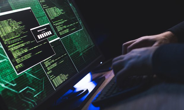 A hacker at work. Unlike typical cyberattacks, a supply chain infiltration requires more sophistication and patience than a script kiddie, phishing scam or brute force attack. However, while it is still possible that a supply chain cyberattack may commence as a typical phishing scam, the sophistication of a supply chain infiltration comes into play after the initial intrusion. (Credit: Husjur02/Shutterstock.com)