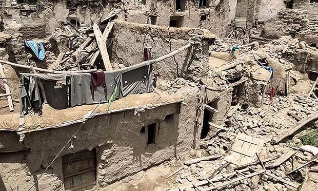 Damaged houses are pictured following an earthquake in Gayan district, Paktika province on June 22, 2022. Economic losses from the event are anticipated to be minimal as the primarily residential area has seen little development as it is rural and mountainous, CoreLogic reported. (Credit: AFP/Getty Images)