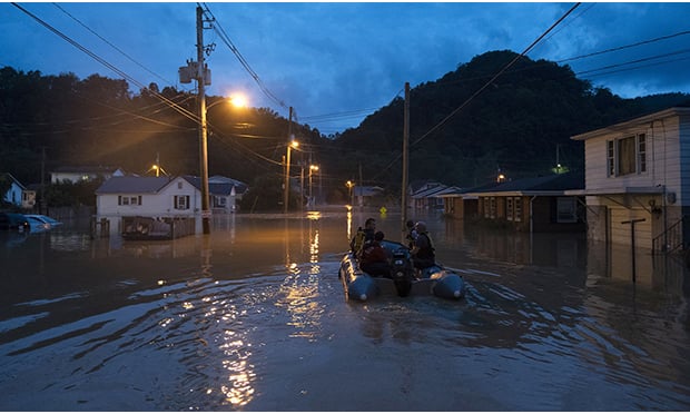 The North Fork Kentucky River in Jackson jumped 37.5 feet in under 33 hours as rains came down, according to the National Weather Service. (Photo: Members of the Jackson Fire Department prepare to conduct search and rescue operations downtown on July 28, 2022 in Jackson, Kentucky. Credit: Michael Swensen/Bloomberg)