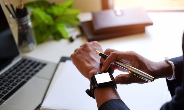 Businessman Looking At Smart Watch