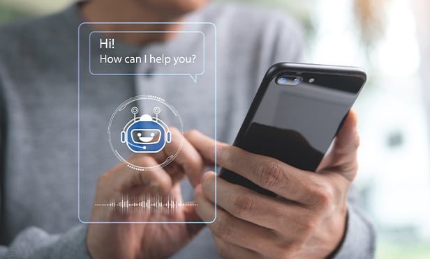 Person using a chatbot on a mobile phone.