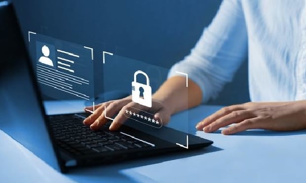 Person working on a company's cybersecurity protocols.