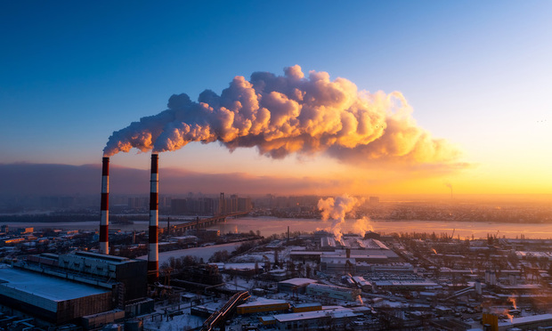Smoke comes from stocks at a factory