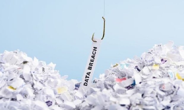 Phishing hook illustrating a data breach attempt.