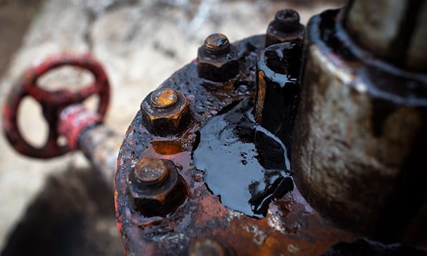Oil on a pumpjack in Russia. Photographer: Andrey Rudakov/Bloomberg