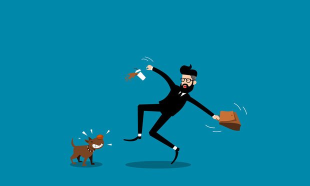 New York defines a dangerous dog as any that without justification attacks a person or companion/farm/domestic animal and causes injury/death or acts threatening. (Credit: Jacky Co/Shutterstock.com)