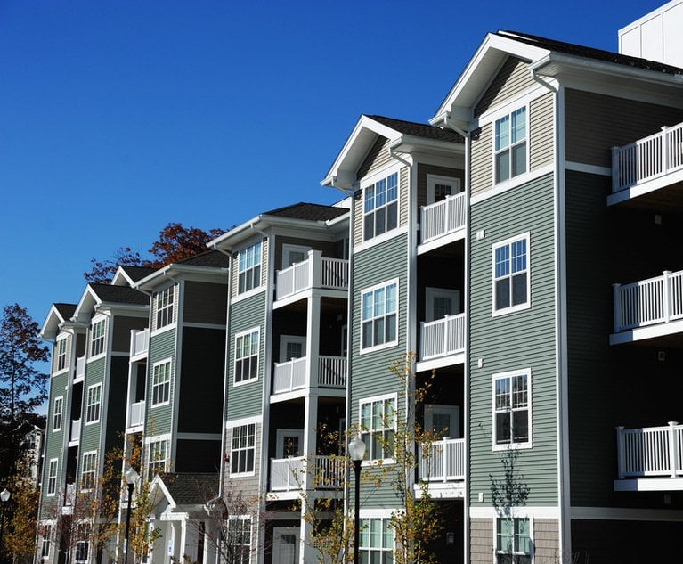 A photo of the outside of an apartment building