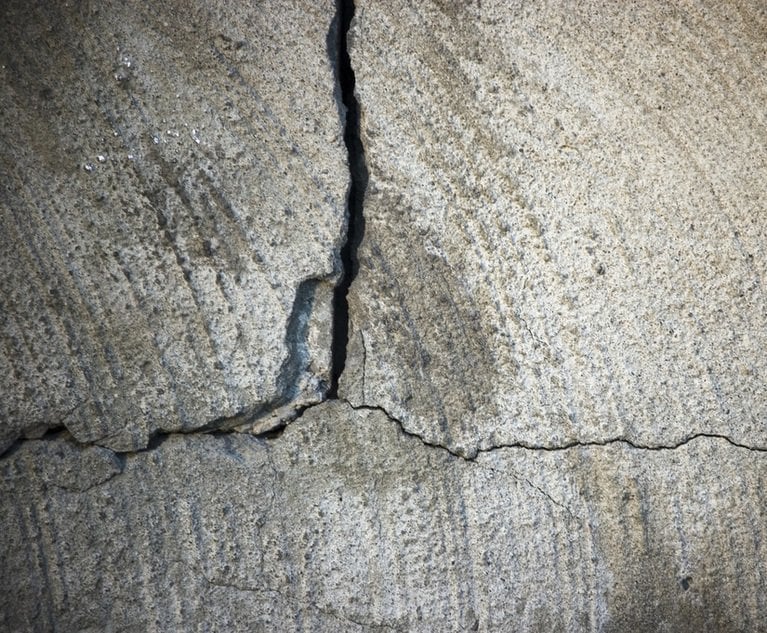 A windstorm caused a tree to fall onto the dwelling, resulting in the foundation cracking. Water then seeped into the crack, causing further damage. How should coverage respond? Credit: Igorsky/Shutterstock