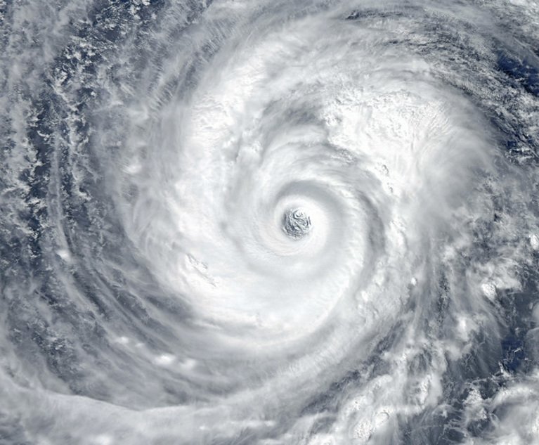 Development is consuming significant acreage in farmland and coastal wetlands that helped to shield urban areas from Gulf waters during hurricanes. (Credit: EvgeniyQW/Adobe Stock)