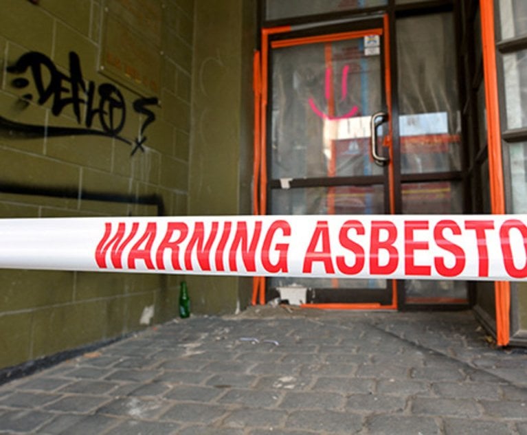 CHRISTCHURCH - DEC 04 2015:Sign reads: Warning - Asbestos removal in progress.Inhalation of asbestos fibers can cause serious and fatal illnesses including lung cancer, mesothelioma and asbestosis.
