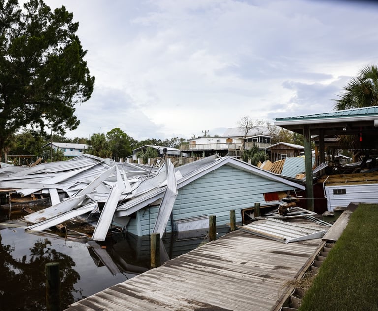 The Florida insurance market reportedly suffers from rampant fraud and misuse of assignment of benefits (AOB). In this photo, debris from Hurricane Idalia litters a canal in Horseshoe Beach, Fla. (Credit: Eva Marie Uzcategui/Bloomberg)
