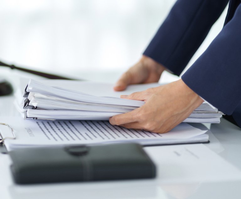 Lawyer working with lawsuit in courtroom,