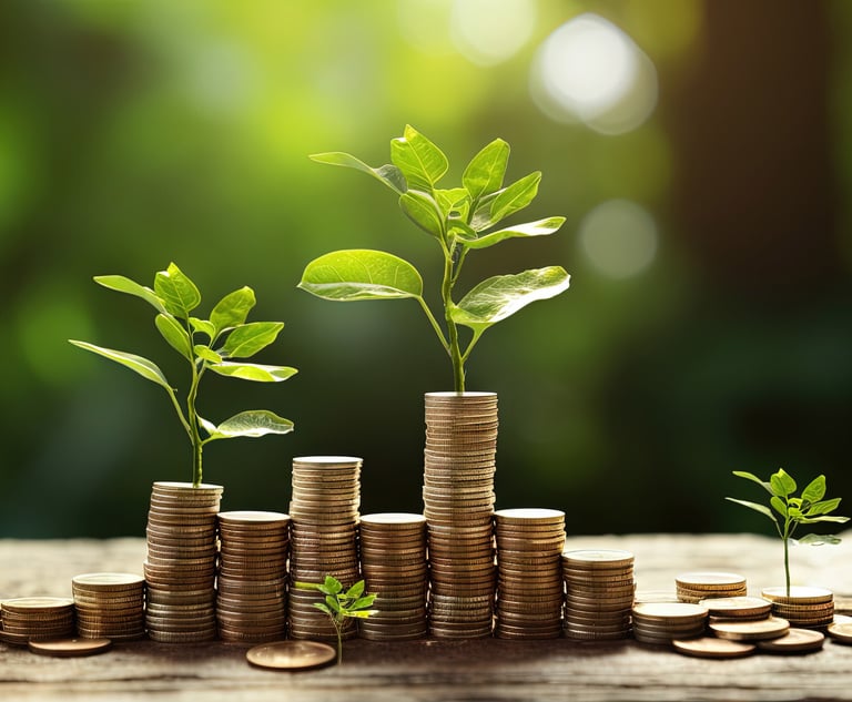 Stacks of coins with plants growing out of them