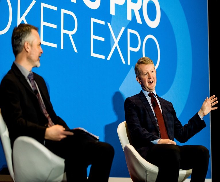 BenefitsPRO Editor-in-Chief Paul Wilson (left) shares audience questions with Ken Jennings, whose keynote address on Mon., Apr. 29, 2024, marked the beginning of the 20th annual BenefitsPRO Broker Expo at the Gaylord Rockies Resort & Convention Center in Colorado. (Credit: Lauren Lindley Photography for BenefitsPRO)