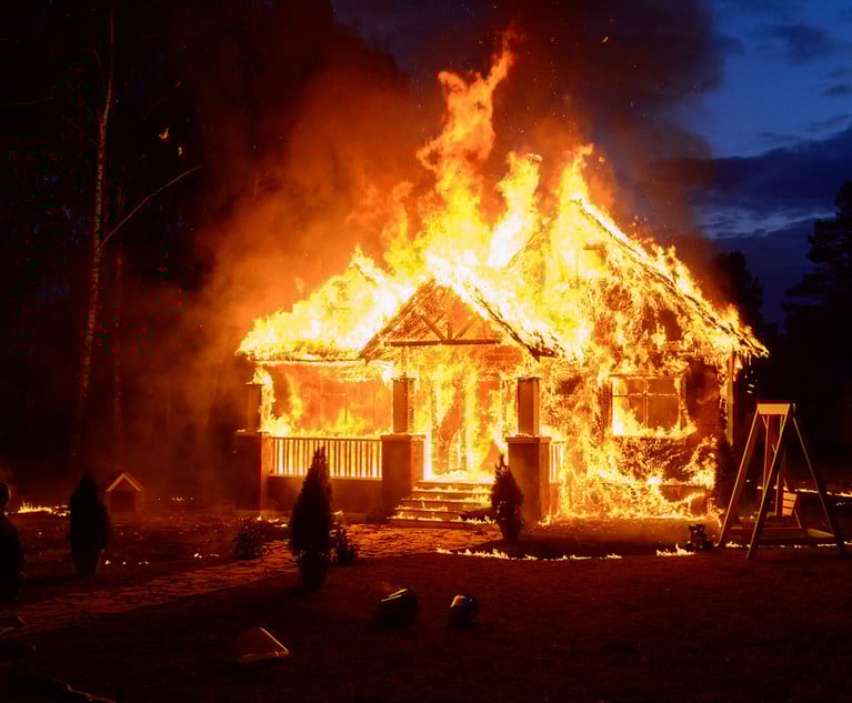 A house engulfed in flames.