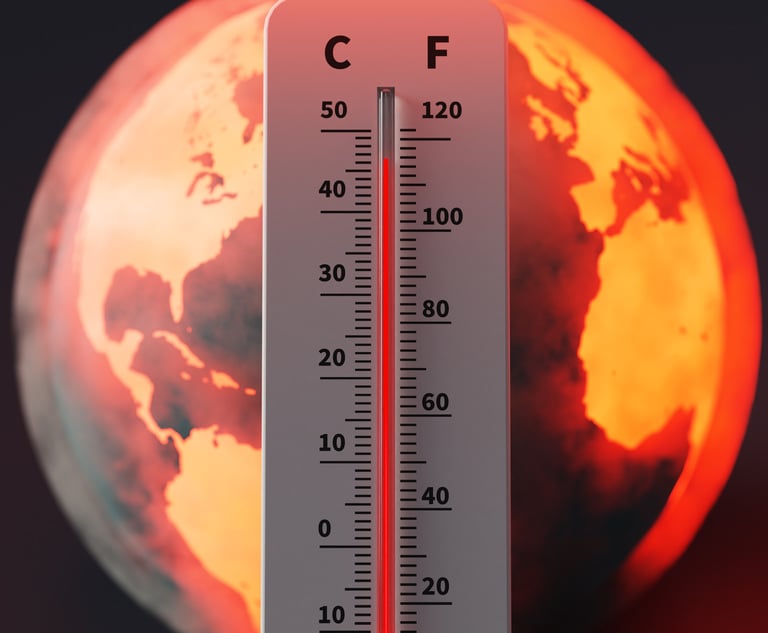 A illustration of a thermometer registering high temperatures in front of the earth.