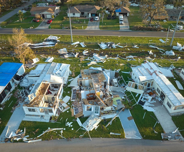 Hurricane Ian destroyed homes in Florida residential area. Credit: bilanol/Adobe Stock