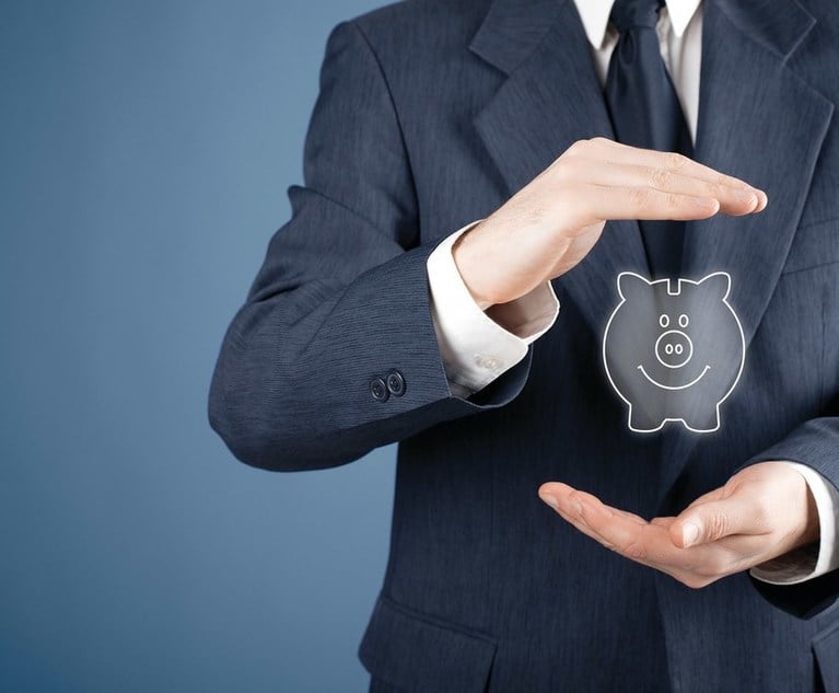 A business man showcasing a graphic of a piggy bank