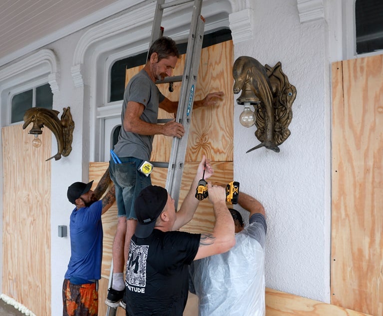 Protective measures are made to a business ahead of Hurricane Debby in Cedar Key, Fla., on Aug. 4. (Photo credit: Bloomberg)