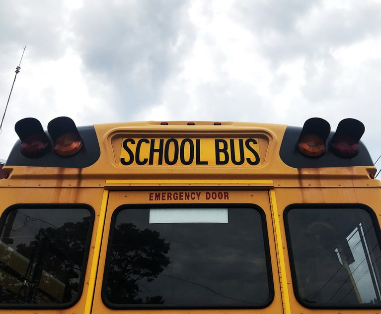 Close-up photo of the back of a school bus