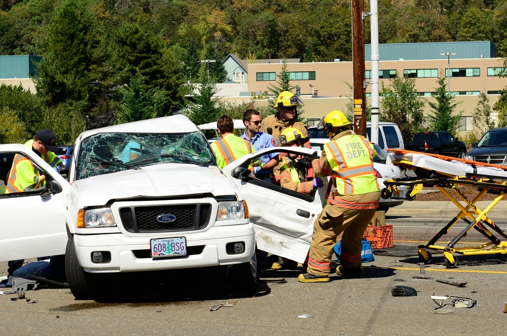 Car crash with rescue workers