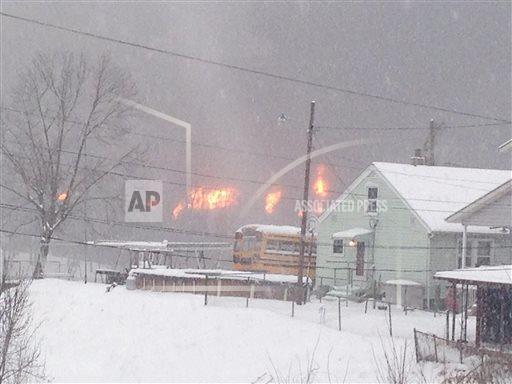 House with fire from train