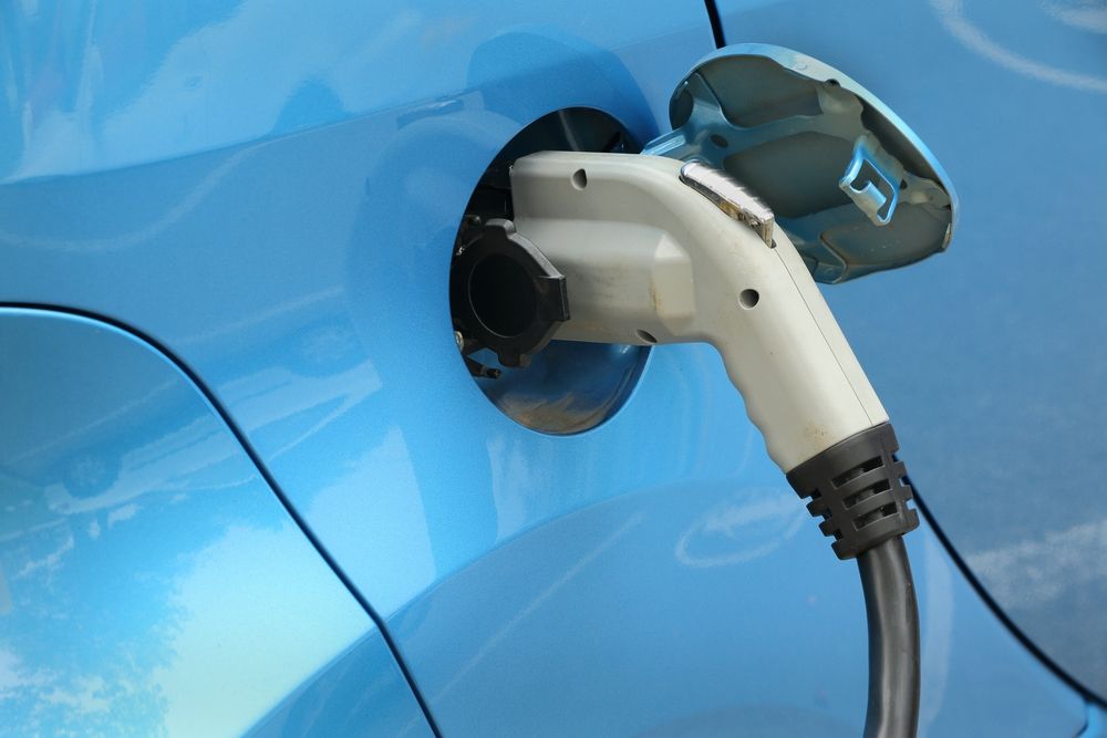 Blue electric car plugin