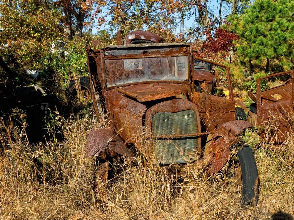 rusted old Ford Model-T