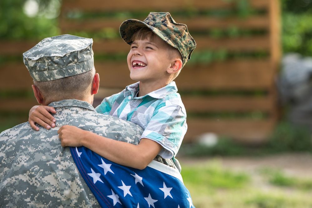 military man in uniform with son