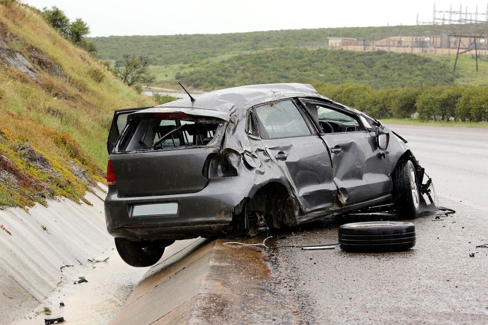 wrecked silver car