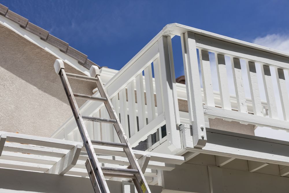 ladder leaning against second floor deck