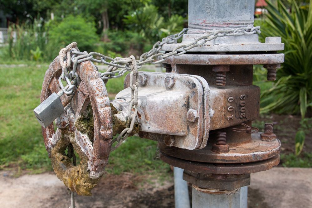 rusted pipes chained and locked