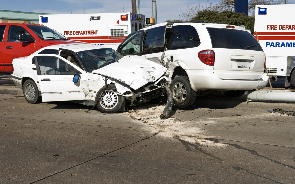 car crash with emergency personnel at site