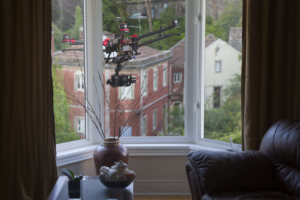 Drone-hovering-outside-living-room-window-SS-alik