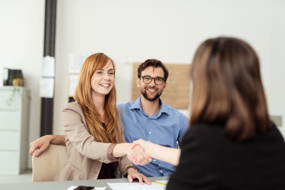 women shaking hands