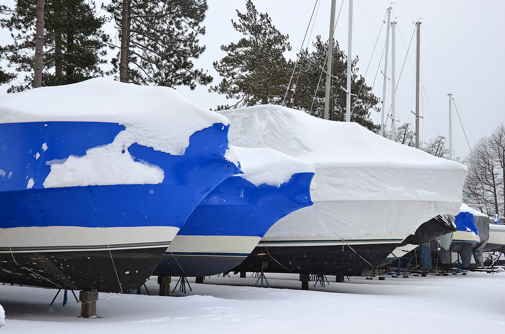 Boats-in-shrink-wrap-with-snow-shutterstock_129244289_Maria Dryfhout