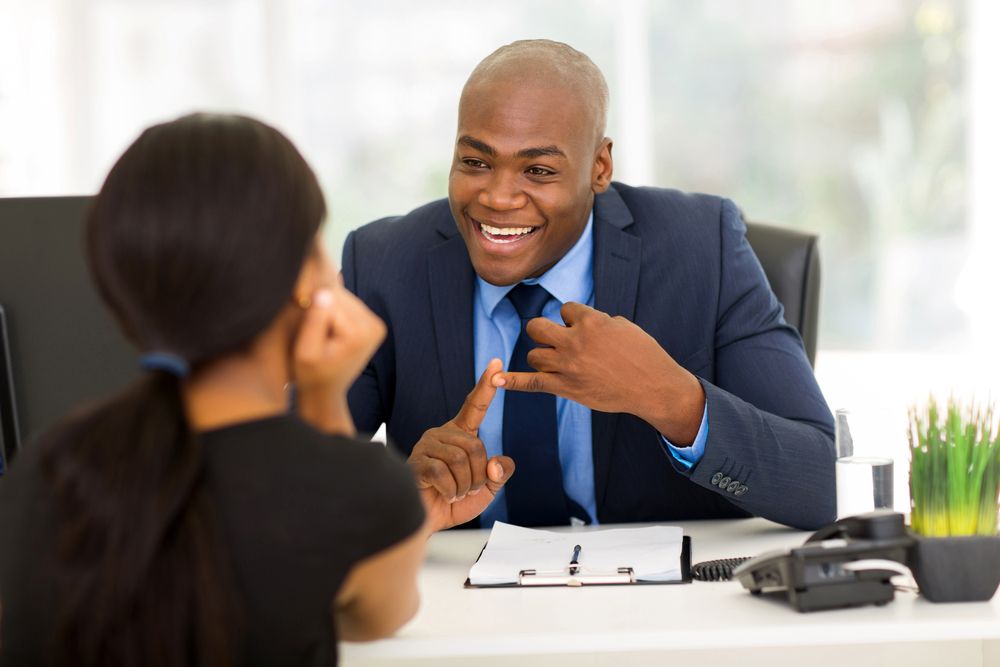 insurance agent talking to woman client