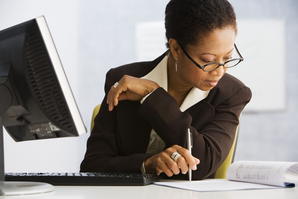 woman insurance agent working at desk