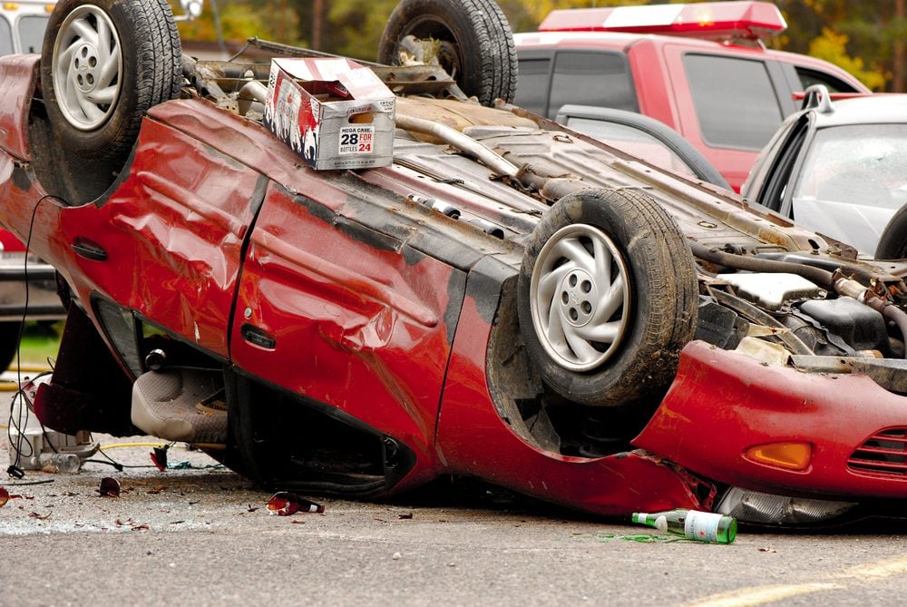 red overturned car