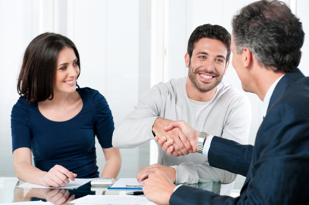 insurance clients shaking hands