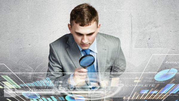 Businessman examining data