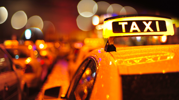 Taxis-at-night-Shutterstock-113840083