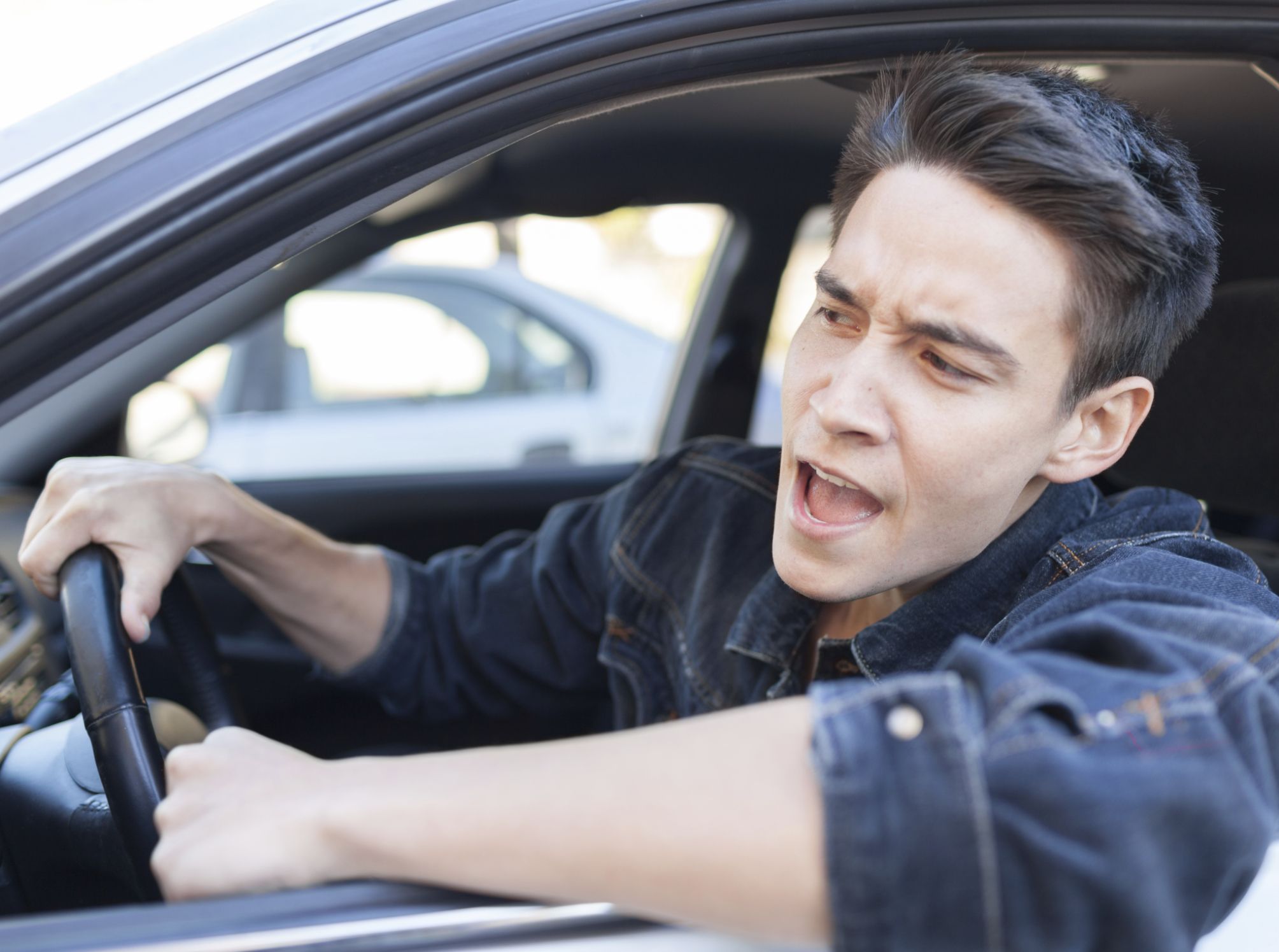 irritated driver yelling at other driver