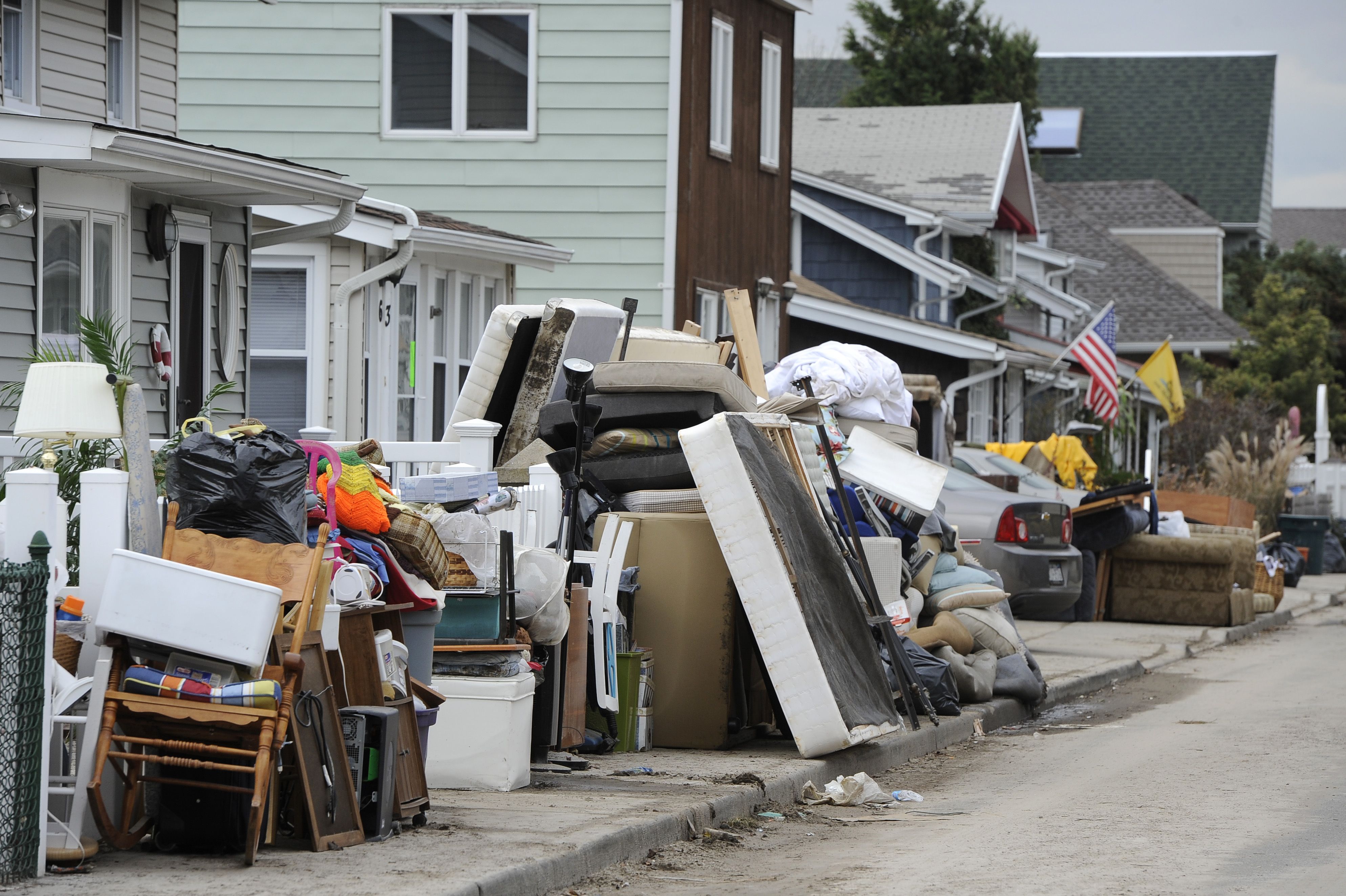 Household items destroyed from flooding from Hurricane Sandy line California Street on Thursday, Nov 1, 2012, in Long Beach, N.Y.