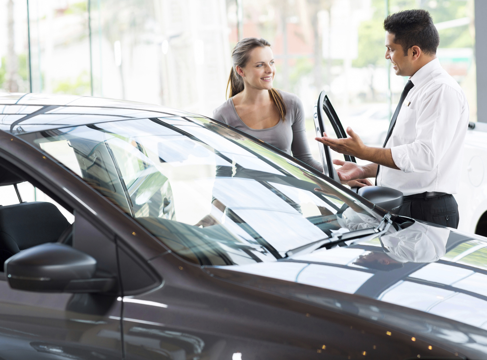 Young-woman-getting-ready-to-test-drive-car-crop-ThinkstockPhotos-512545975-michaeljung