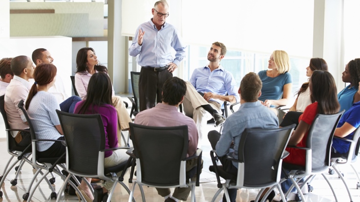 people meeting in a circle