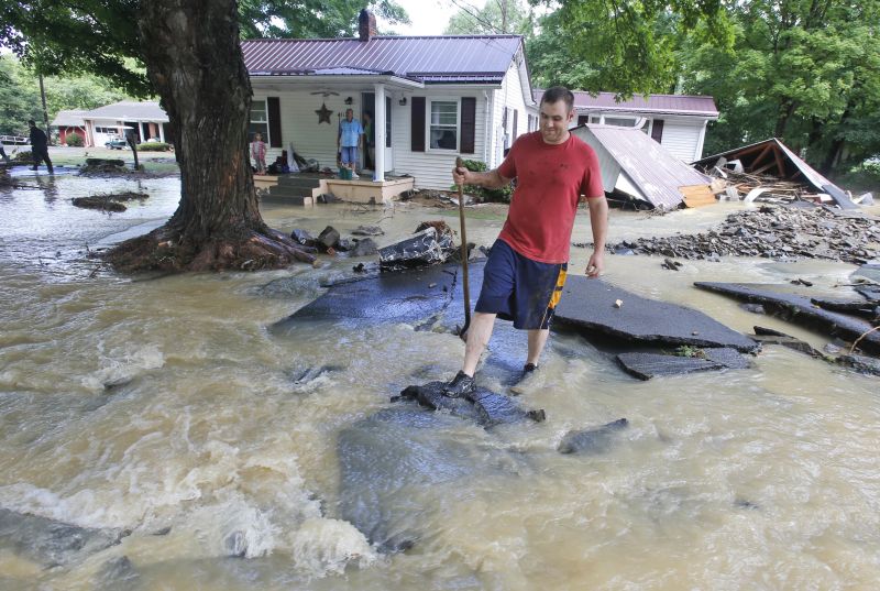 Mark Bowes, of White Sulphur Springs W. Va., makes his way to the road 